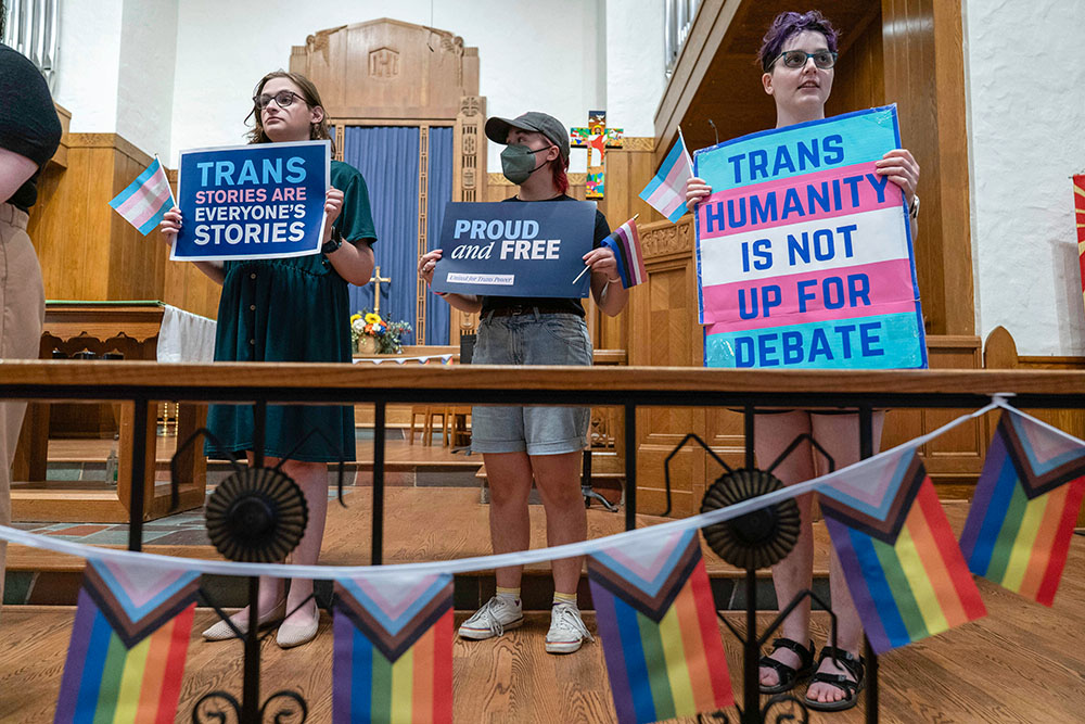 Transgender rights supporters rally at the Lutheran Church of the Reformation on Capitol Hill, June 18, 2025, in Washington after the Supreme Court upheld Tennessee's ban on gender-affirming care for transgender minors. (AP/Jose Luis Magana)