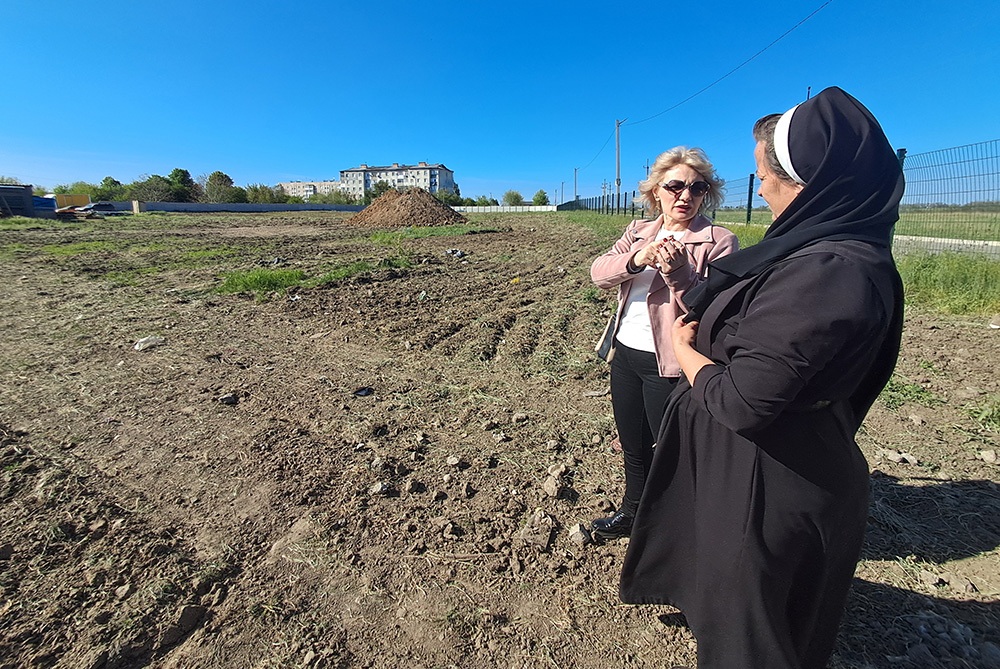 Sr. Lucia Murashko and St. Don Bosco School principal Vitalia Vovk are pictured at the site of the new school campus in Zaporizhzhia, a city in southern Ukraine. (Marc Roscoe Loustau)