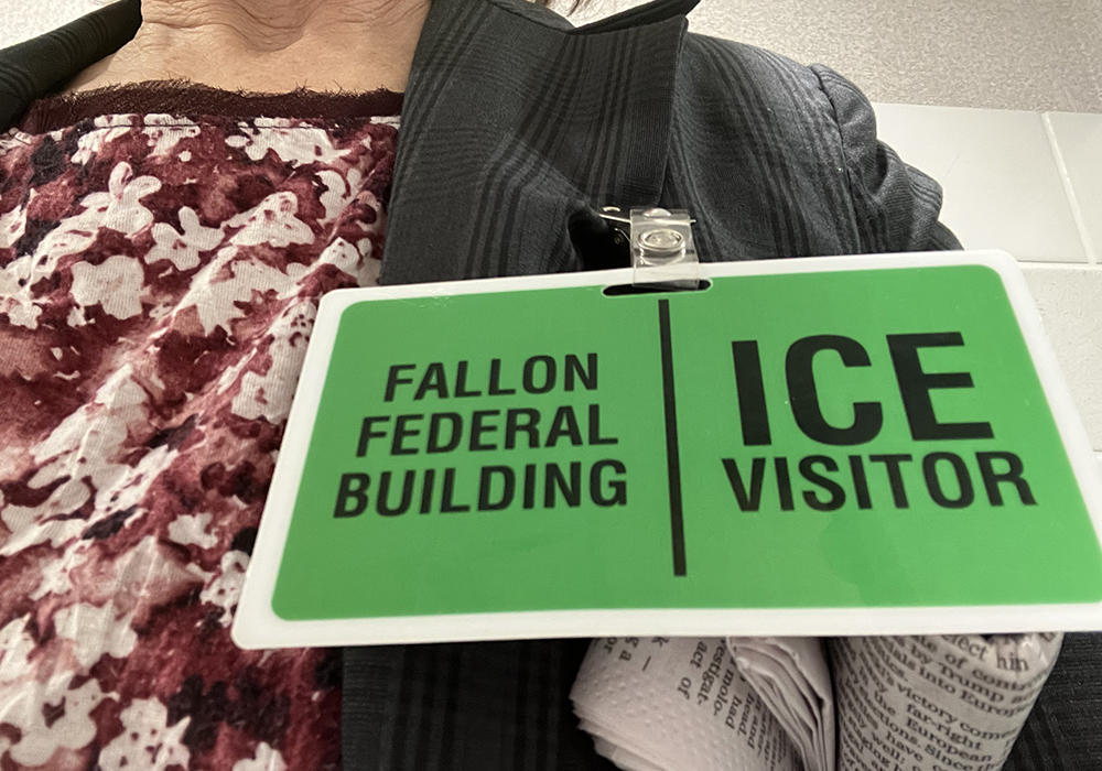 An ID badge for a visitor at George H. Fallon Federal Building in Baltimore, a check-in field office for the U.S. Immigrations and Customs Enforcement. (NCR photo/Patricia Zapor)