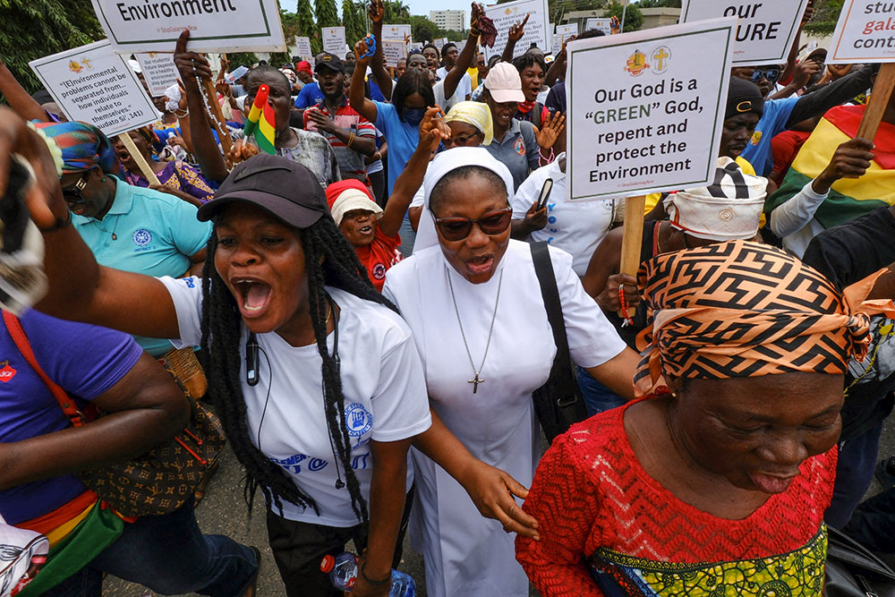 Members of the Accra Archdiocese in Ghana Oct. 11, 2024, demonstrate against illegal mining. In a first-ever joint appeal released July 1, 2025, Catholic bishops in Latin America, Africa and Asia called for an end to fossil fuels and decried the exploitation of natural resources, ecosystems and people. (OSV News/Reuters/Francis Kokoroko)