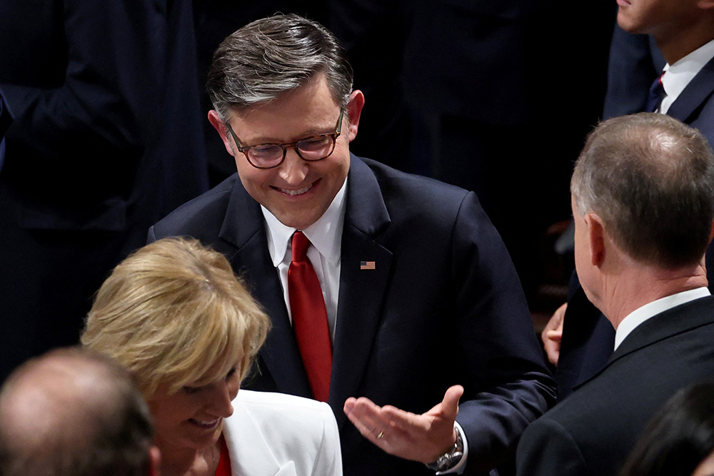 U.S. House Speaker Mike Johnson, R-La., speaks with other members of the House July 3, 2025, on Capitol Hill in Washington after final passage of U.S. President Donald Trump's sweeping spending and tax bill. (OSV News/Reuters/Jonathan Ernst)