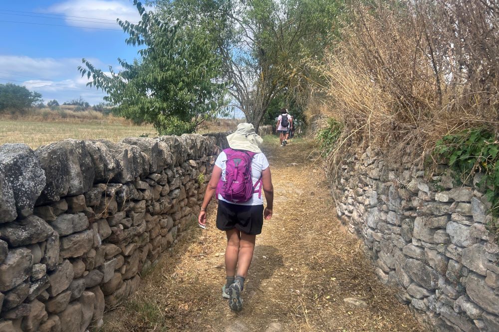 A pilgrim walks along the Ignatian Way. A pilgrim walks along the Ignatian Way.