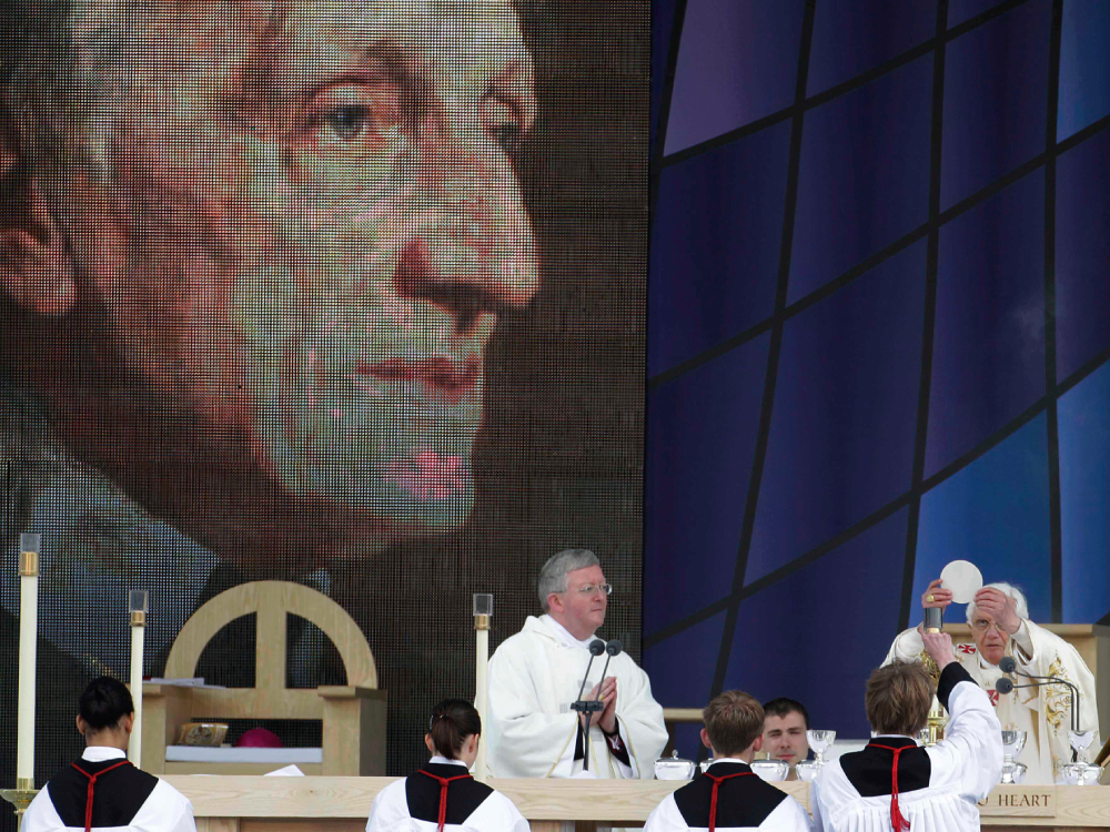 Pope Benedict XVI, right, celebrates a beatification mass for Cardinal John Henry Newman Pope Benedict XVI, right, celebrates a beatification mass for Cardinal John Henry Newman in Birmingham, England, Sunday, Sept. 19, 2010. (AP/Gregorio Borgia)
