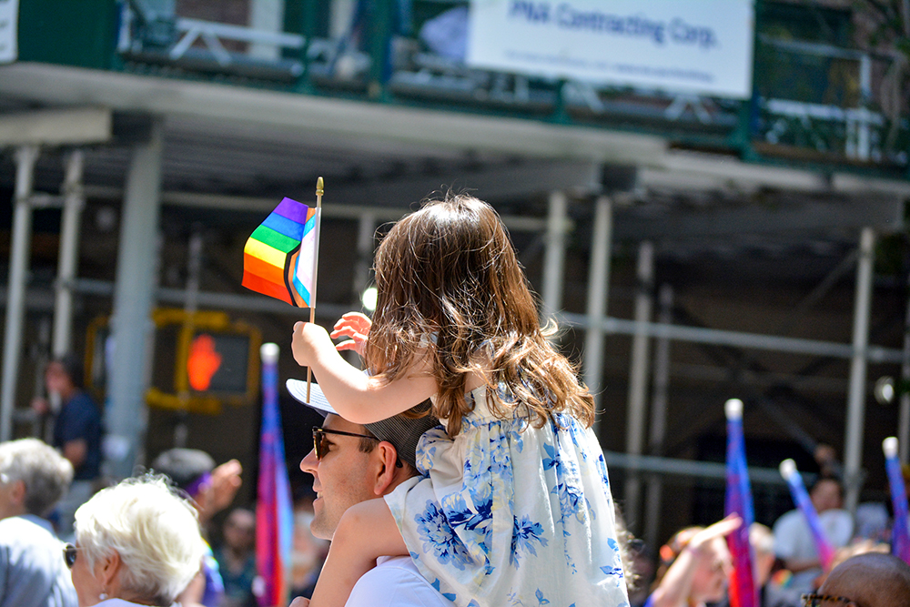 A child waves a pride flag at the New York City Pride Parade in Manhattan June 29, 2025. (Dreamstime/Cpenler)