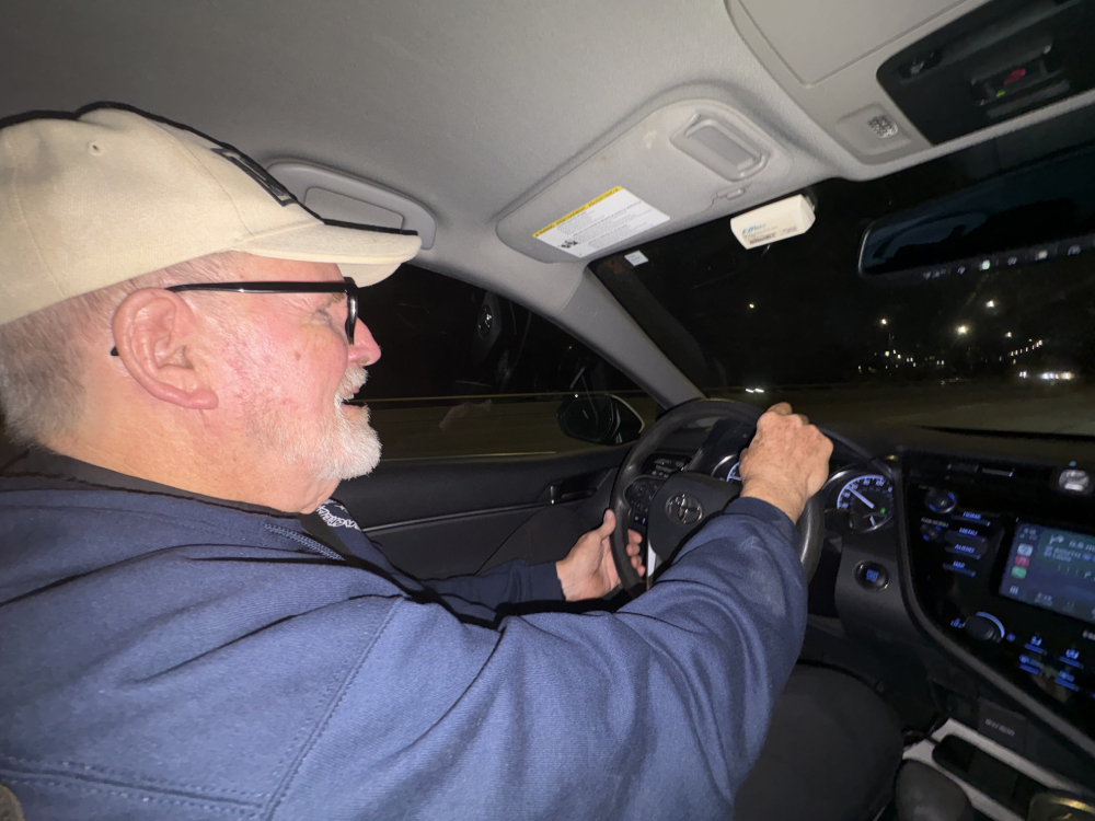 Fr. Dennis Berry helps Venezuelan migrants with laundry services at his parish in Chicago.