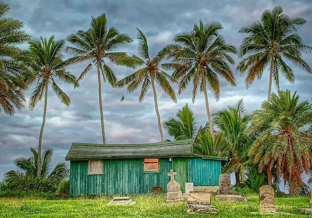 A beachside gravesite in Kalaupapa is pictured. While more than 8,000 people were exiled to Kalaupapa, only about 2,000 marked graves survive today. (National Park Service/Dewitt Jones) A beachside gravesite in Kalaupapa is pictured. While more than 8,000 people were exiled to Kalaupapa, only about 2,000 marked graves survive today. (National Park Service/Dewitt Jones)