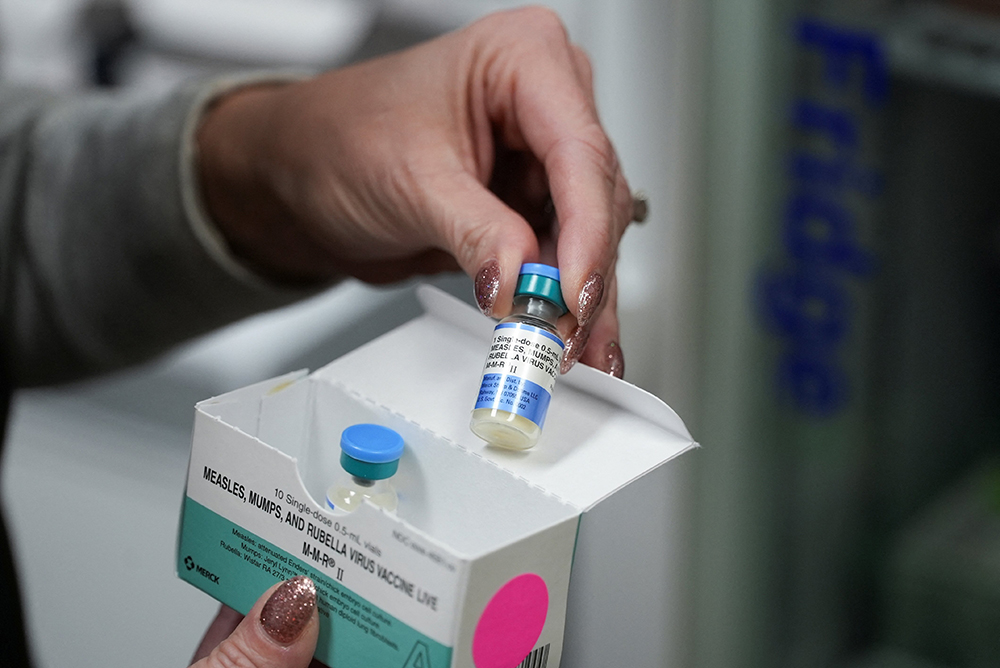 Dr. Leigh Bragg, pediatrician at Tiger Pediatrics, holds an MMR vaccine in Easley, S.C., Feb. 6, 2026. The MMR vaccine is a highly effective, safe, 2-dose immunization that protects against measles, mumps, and rubella. (OSV News/Reuters/Jayla Whitfield-Anderson)