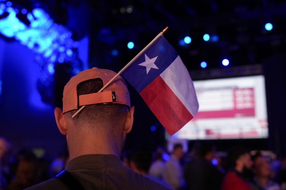 A supporter of Texas state Rep. James Talarico, a Democratic candidate for the U.S. Senate, wears a Texas state flag in their hat during a primary election watch party March 3 in Austin, Texas. Talarico won the Democratic nomination. (AP/Eric Gay)