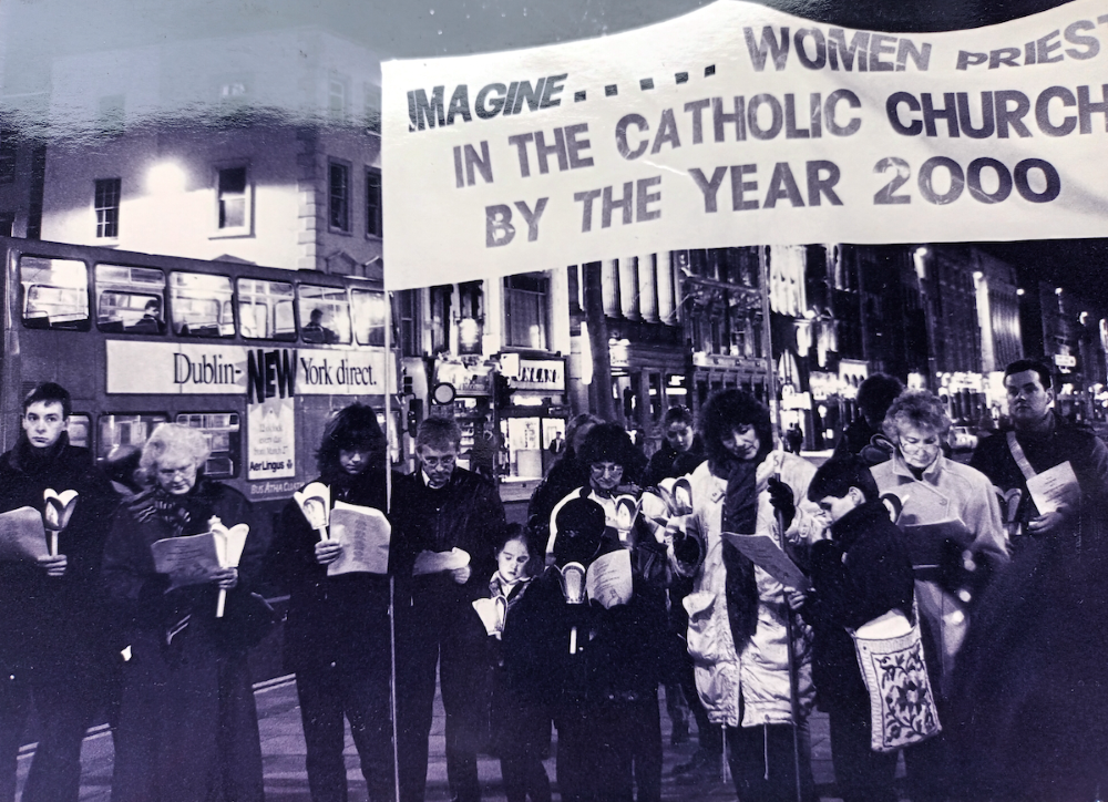 A banner reads "Imagine women priests in the Catholic Church by the year 2000" at the first World Day of Prayer for the Ordination of Women Priests, held March 25, 1994, in Dublin. (Courtesy of Soline Humbert)