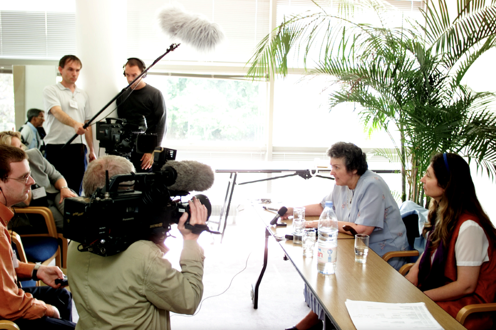 Soline Humbert, right, sits with Benedictine Sr. Joan Chittister at the Women's Ordination Worldwide Dublin press conference in 2001. (Courtesy of Soline Humbert)
