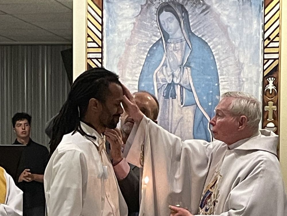 Cam Obi, a music producer and musician who has worked with some of the biggest names in hip-hop and R&B, converted to Catholicism at the Easter Vigil. He was baptized at Prince of Peace Catholic Church in Albuquerque, New Mexico. (Courtesy of Cam Obi)