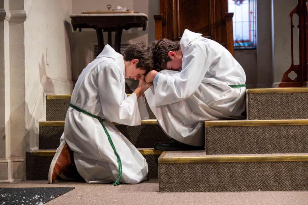 Julius Rinzel and Ivan Howe play teenage altar servers in "The Saviors," written by Bubba Weiler and directed by Jack Serio. The off-Broadway show is produced by the Atlantic Theater Company in New York City. (Ahron R. Foster)