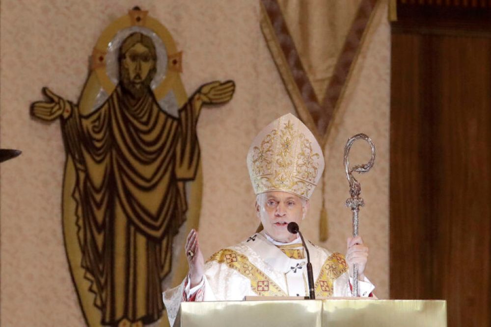 In this Sunday, April 12, 2020, file photo, San Francisco Archbishop Salvatore Cordileone celebrates Easter Mass, which was livestreamed, at St. Mary's Cathedral in San Francisco. (RNS/AP/Jeff Chiu)