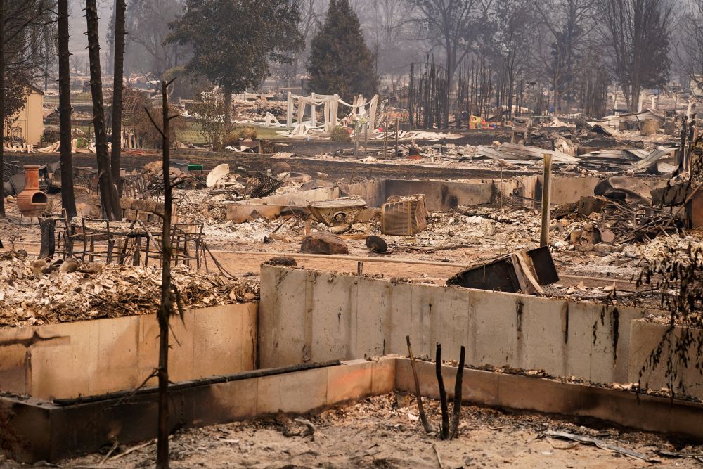 Destroyed homes are seen in a neighborhood in Spokane, Wash., Aug. 3, 2026, after a wildfire swept through the neighborhood. (OSV News/Reuters/David Ryder)