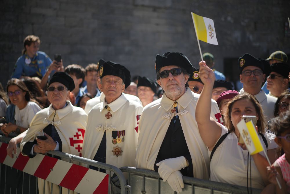 Faithful wait for Pope Leo XIV outside the Basilica during his visit to San Marino Aug. 22, 2026. (AP/Andrew Medichini) 