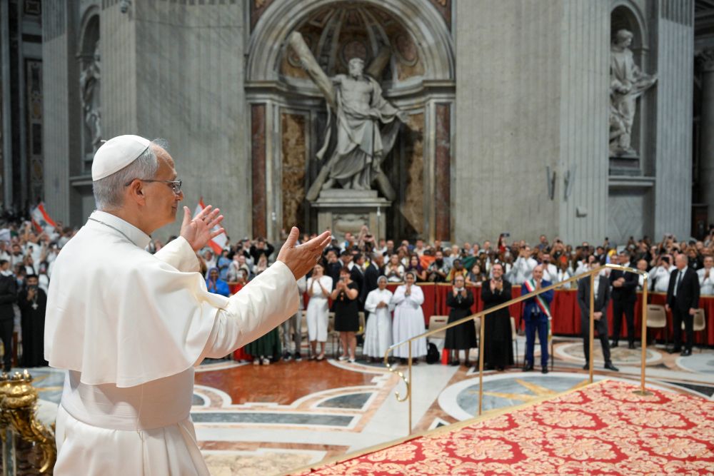 Pope Leo XIV greets visitors and pilgrims during his weekly general audience in St. Peter's Basilica at the Vatican Aug. 19, 2026. (CNS/Vatican Media)