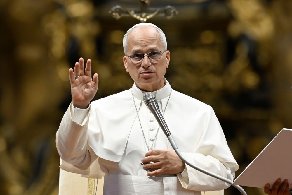 Pope Leo XIV offers his blessing to visitors and pilgrims during his weekly general audience in St. Peter's Basilica at the Vatican Aug. 26, 2026. (CNS/Vatican Media)