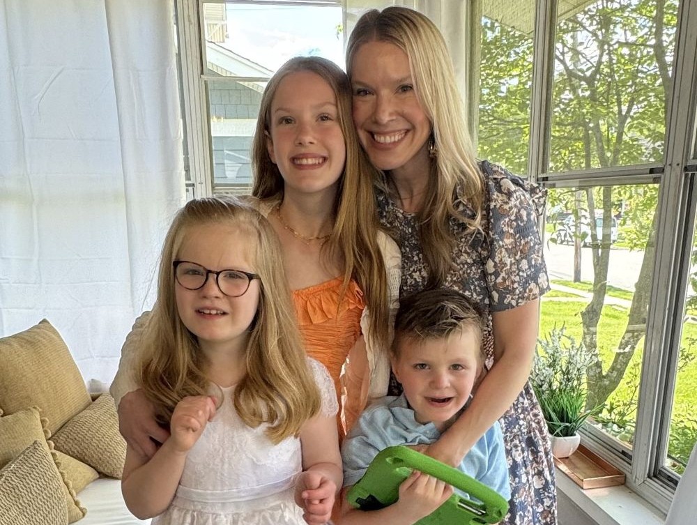The author poses with her three children. (Courtesy of Sarah Kernion)