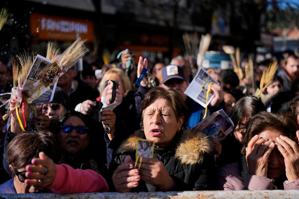 Pilgrims attend an outdoor Mass outside the Church of San Cayetano during the annual pilgrimage honoring St. Cajetan, the patron saint of work, in Buenos Aires, Argentina, Aug. 7, 2026. (AP/Natacha Pisarenko)