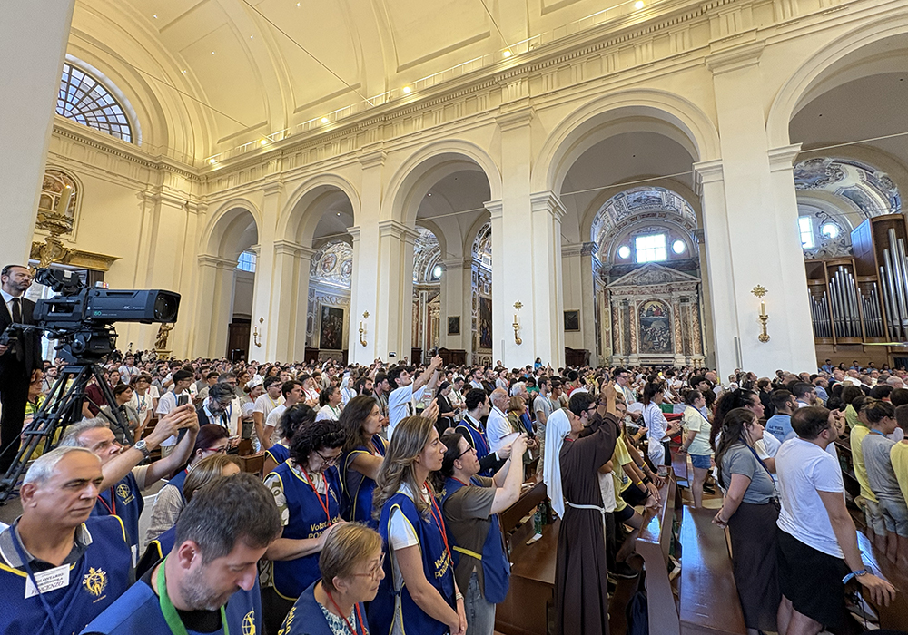  Young Franciscans and their leaders are gathered in the Basilica of Santa Maria degli Angeli in Assisi, Italy, for a Mass with Pope Leo XIV, Aug. 6, 2026. (NCR photo/Camillo Barone)