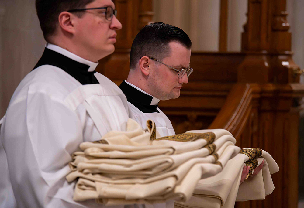 Archdiocese of Newark seminarian Joseph Grabowski Jr., left, is pictured with fellow seminarian James McElroy, serving at the archdiocese's presbyteral ordination Mass on May 23, 2026, at the Cathedral Basilica of the Sacred Heart in Newark. (Courtesy of Archdiocese of Newark)