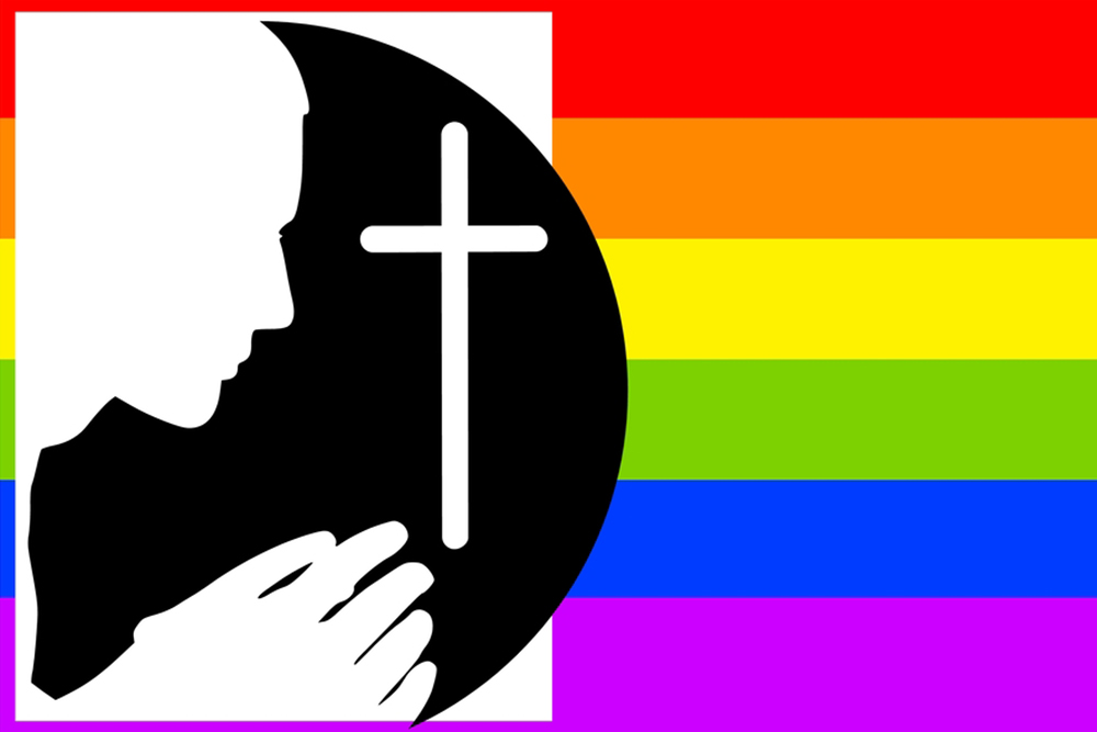 Silhouette of a man praying with gay pride flag colors (Dreamstime/Madartists)
