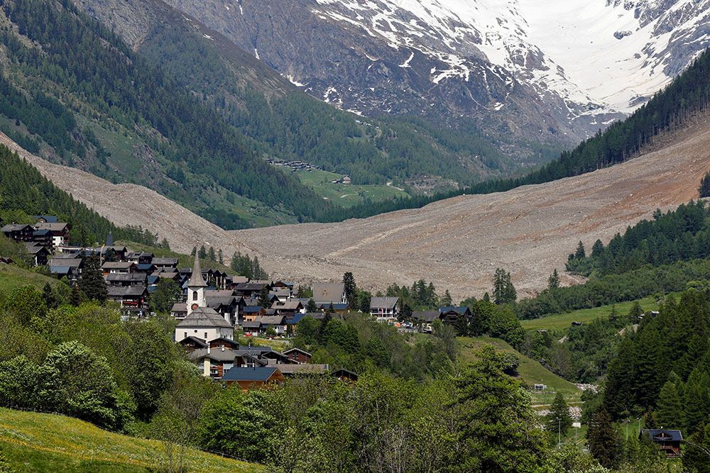Debris lies from a crumbling glacier May 29, 2025, that partially collapsed and tumbled behind Wiler, near Blatten, Switzerland, May 29, 2025. (OSV News/Reuters/Stefan Wermuth)