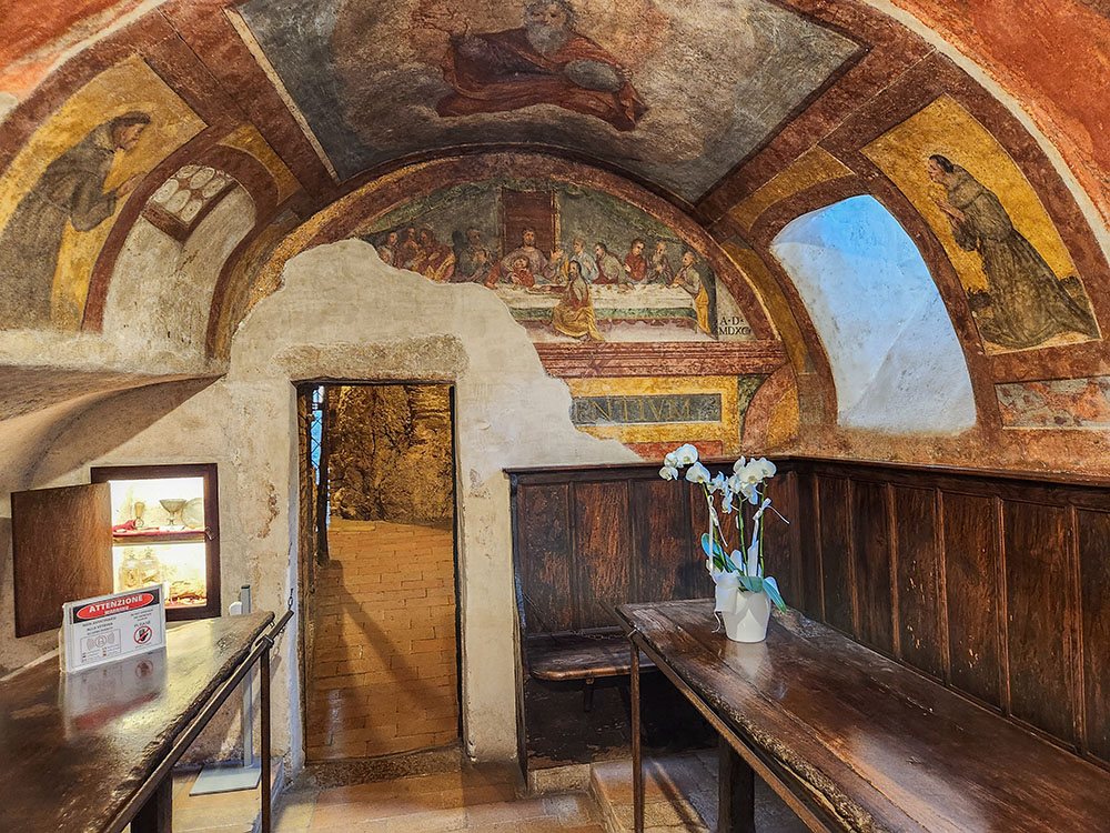 Frescoes seen on the walls inside Eremo delle Carceri (NCR photo/Brian Roewe)