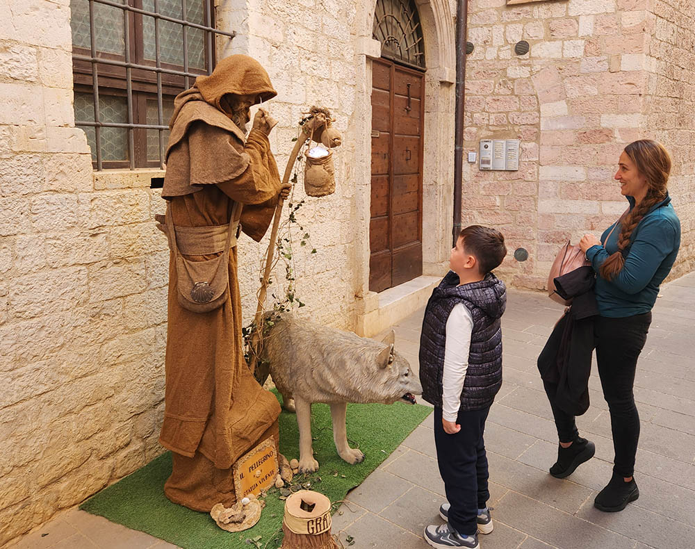 A man depicts St. Francis in the streets of Assisi, Italy. (NCR photo/Brian Roewe)