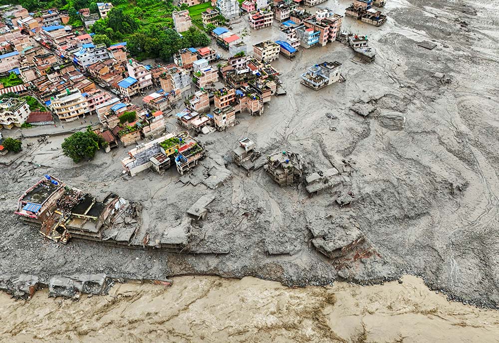 A drone view shows mud covering properties at Trishuli in Nepal's Nuwakot district Aug. 27, 2026, following devastating floods. (OSV News/Reuters/Navesh Chitrakar)
