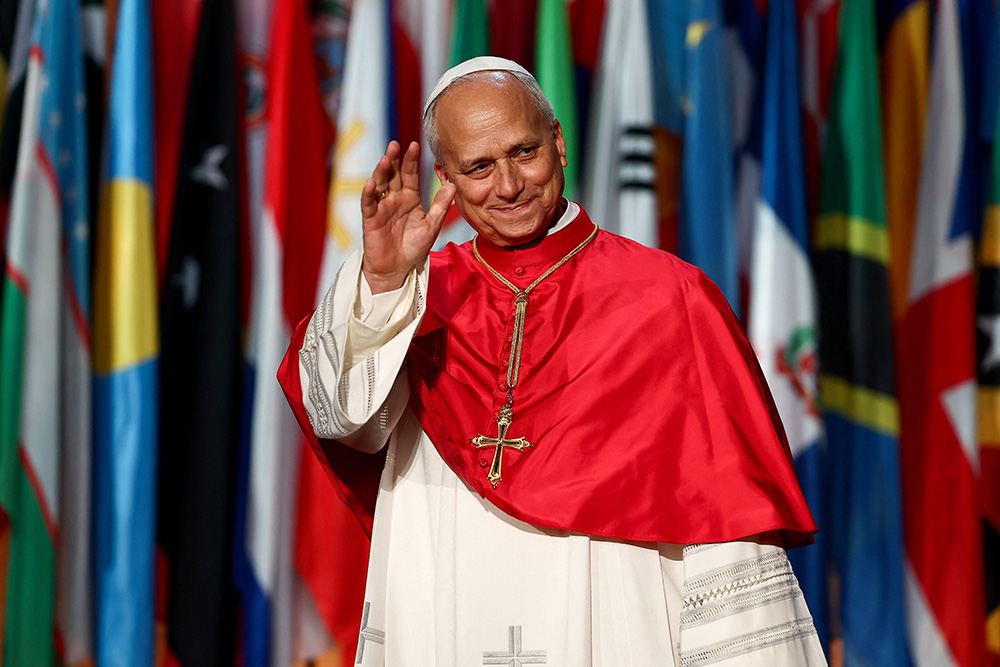 Pope Leo waves as he attends a meeting at the UNESCO headquarters in Paris Sept. 25, 2026, as part of his four-day apostolic journey to France. (OSV News/Reuters/Abdul Saboor)