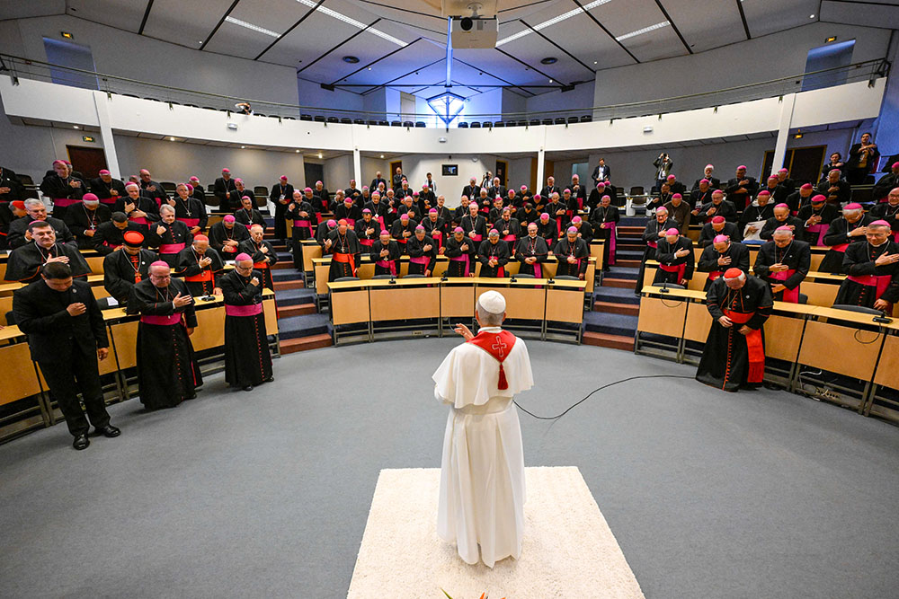 Pope Leo XIV meets with members of the French bishops' conference in the Sainte-Bernadette auditorium at the Shrine of Our Lady of Lourdes in Lourdes, France, Sept. 27, 2026. (CNS/Vatican Media)