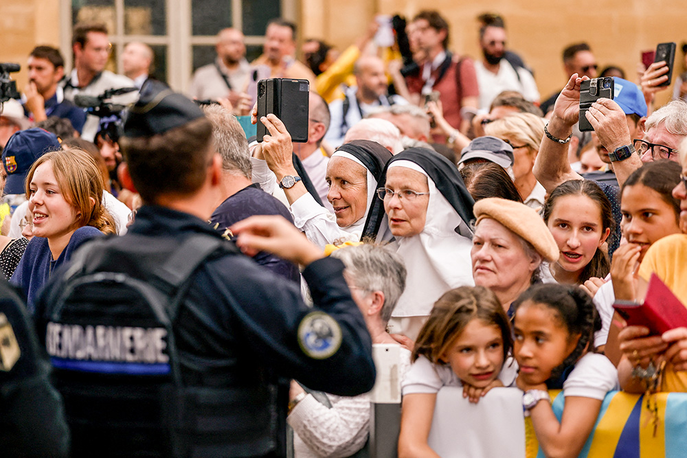 People gather after Pope Leo XIV celebrated Mass at the Metz Cathedral in France Sept. 28, 2026. (OSV News/Reuters/Benoit Tessier)