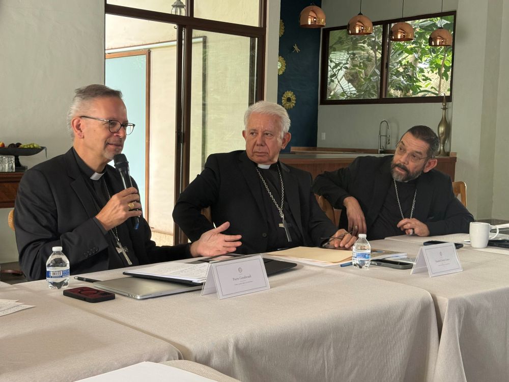 Bishop Pierre Goudreault, president of the Canadian Conference of Catholic Bishops, shares a few words while Bishop Ramón Castro Castro, president of the Mexican Bishops' Conference, and Bishop Daniel  Flores, vice president of the U.S. Conference of Catholic Bishops, look on during a trilateral meeting in Cuernavaca, Morelos state, Mexico. The group met Aug. 30-Sept. 4. (OSV News/Courtesy Mexican Bishops' Conference)
