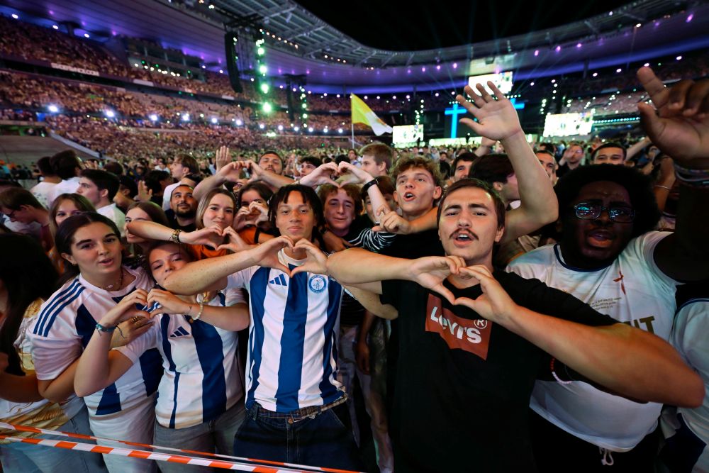 Young people attend a prayer vigil at the Stade de France in Saint-Denis, France, Sept. 25, 2026, during Pope Leo XIV's four-day apostolic journey to France. (OSV News/Vatican Media/Matteo Pernaselci)