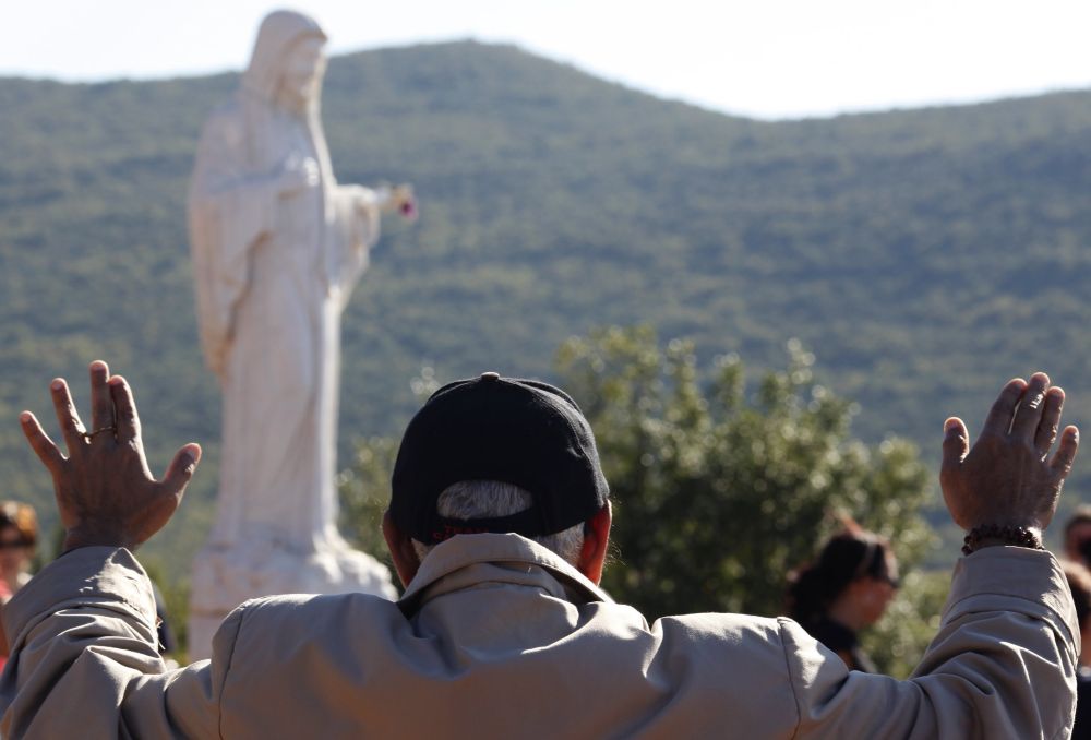 Pope Francis prays during a visit to the Chapel of the Apparitions at Ireland's Knock Shrine Aug. 26, 2018. (CNS/Paul Haring)