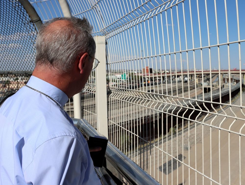 Archbishop Stefan Hesse of Hamburg, who is the special representative for refugee issues for the German Bishops' Conference, looks through the U.S-Mexico border fence Aug. 25, 2026, after returning from Ciudad Juárez, Mexico, to El Paso, Texas. (OSV News/Courtesy German Bishops Conference//Daniela Elpers)