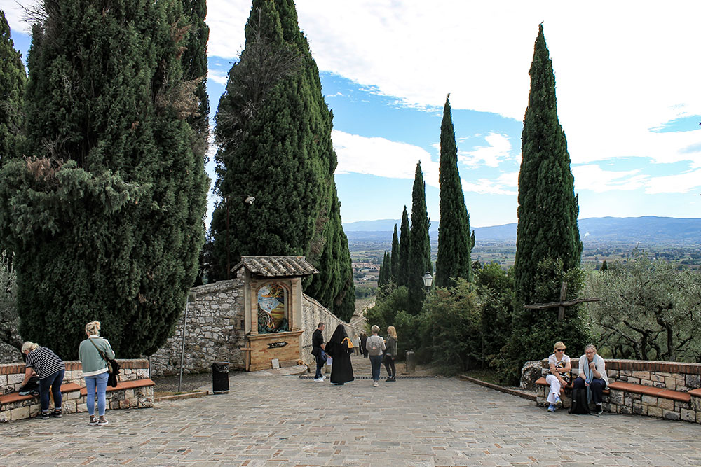 People congregate outside the Church of San Damiano near Assisi, Italy. (NCR photo/Brian Roewe)