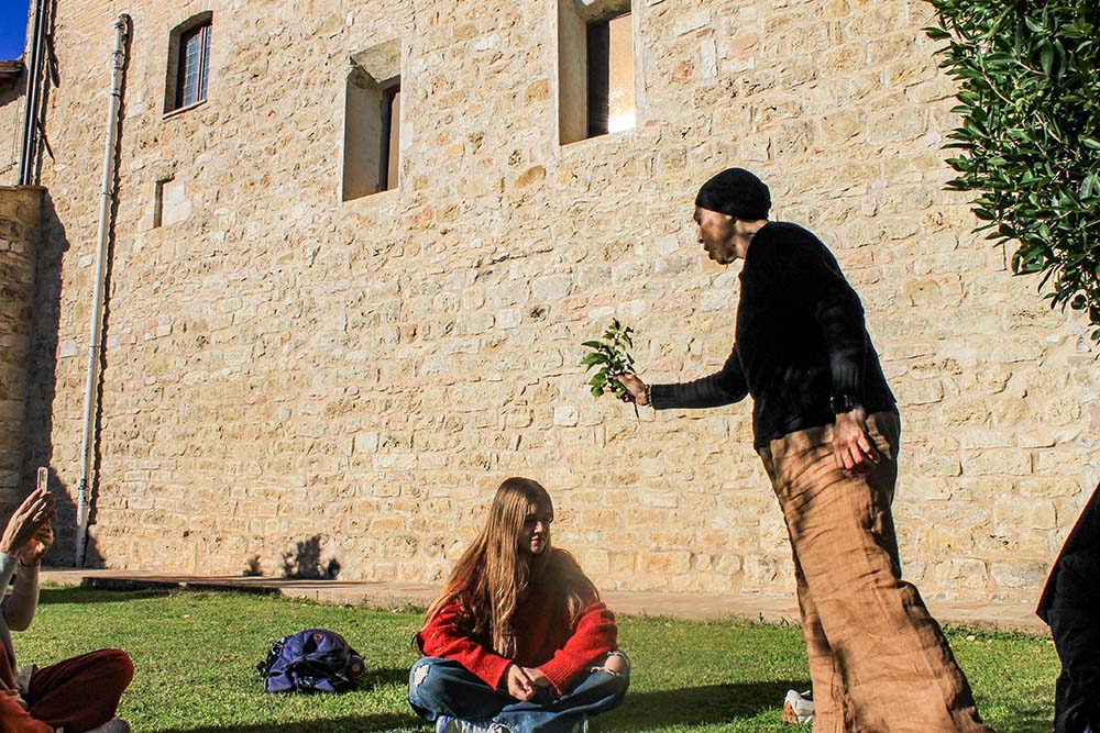 Theresa Ardler takes part in a prayer service in the garden at the Church of San Damiano on Oct. 4, 2025, the feast of St. Francis. (NCR photo/Brian Roewe)