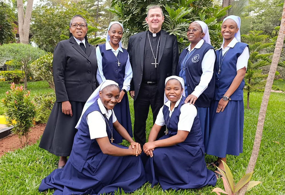 The Notre Dame Community at Syokimau in Kenya pose at their convent July 25, 2026. Pictured, from left: Sr. Jacintha Rantšo of the Servants of the Immaculate Heart of Mary; Notre Dame Sr. Mary Teopista; visiting Bishop John Curtis Iffert of Covington, Kentucky; Notre Dame Srs. Mary Christine and Mary Amalia; in front row: Notre Dame Srs. Mary Lucia and Mary Felisitas. (Sr. Jacintha Rantšo)