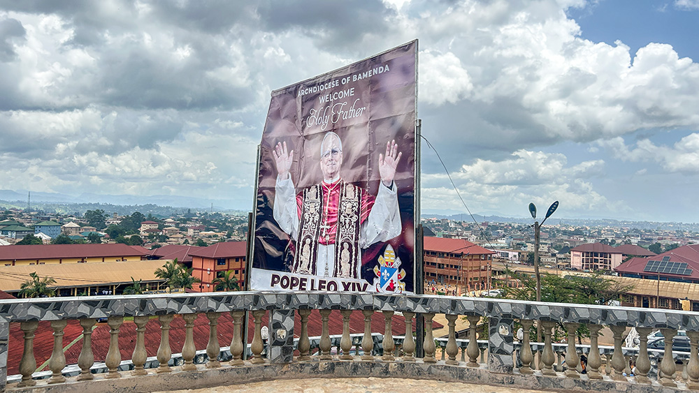 A billboard welcoming Pope Leo XIV overlooks Bamenda in Cameroon's Northwest Region during his April 2026 visit, when he appealed for peace and reconciliation. (GSR photo/Doreen Ajiambo)