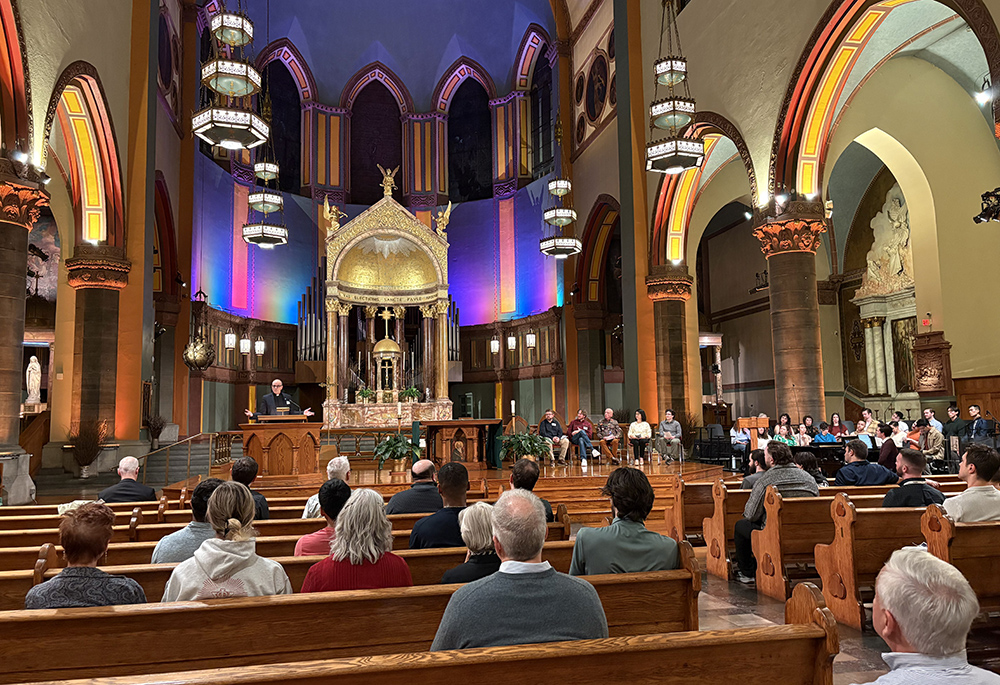 LGBTQ Catholics, clergy, religious, family members and other Catholic pilgrims gather for a final prayer and reflection vigil at the Church of Saint Paul the Apostle in New York City, Sept. 26. (NCR photo/Camillo Barone)