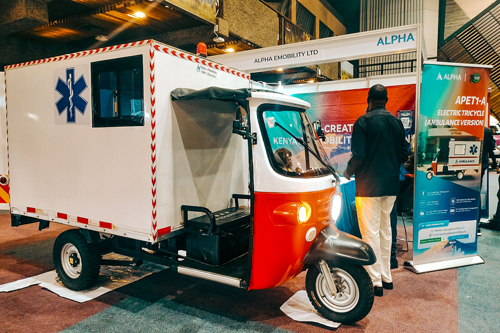A man checks out a display for an electric tricycle ambulance at the E-Mobility Expo in Nairobi, Kenya, June 5, 2026. (Dreamstime/Martin Mwaura)