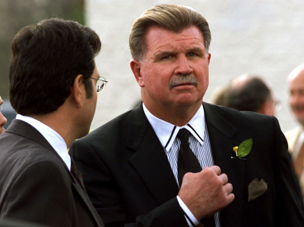 Former Chicago Bears coach Mike Ditka pauses to talk with the media following a private memorial service for the late Chicago Bears running back Walter Payton Nov. 5, 1999. Ditka, who was open about his Catholic faith, died on Oct. 9, 2026, at 86. (OSV News/Reuters/Sue Ogrocki)