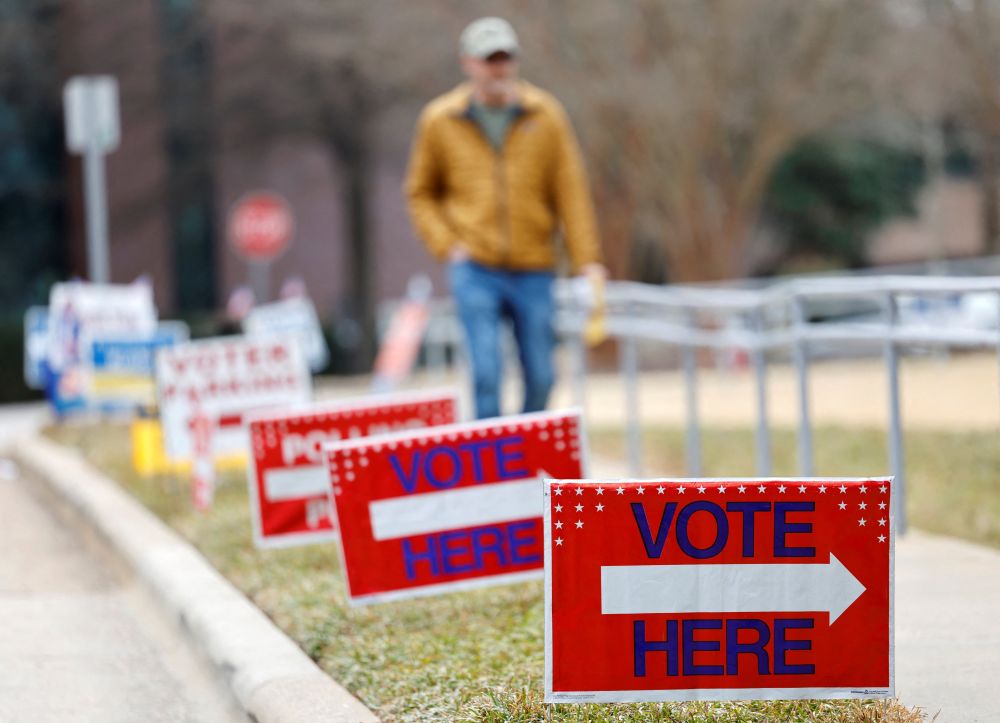 A voter walks toward his polling place in Cary, N.C., during his state's primary election March 3, 2026, to choose candidates for the November midterm elections. (OSV News/Reuters/Jonathan Drake)
