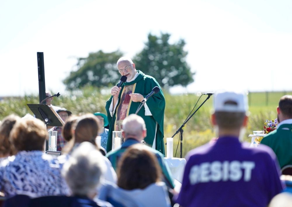 Fr. Jim Farrell of the Archdiocese of Indianapolis delivers the homily at the Sept. 27 Mass at Miami Correctional, a facility that houses approximately 800 ICE detainees. About 450 people attended the Mass. (Courtesy of Allison Mayer)