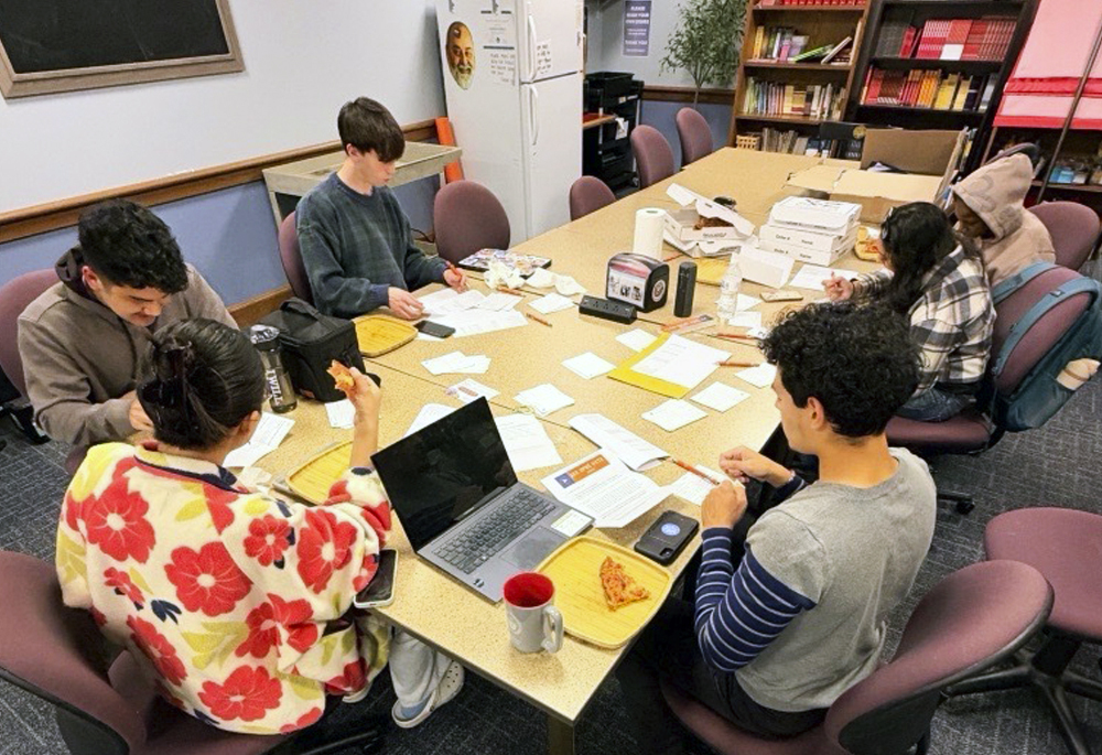 Students attend a postcard writing party hosted by Sr. Carol Coston fellows Chase Tuller and Anthony Miranda at John Carroll University in Cleveland, October 2026. (Courtesy of Chase Tuller and Anthony Miranda)