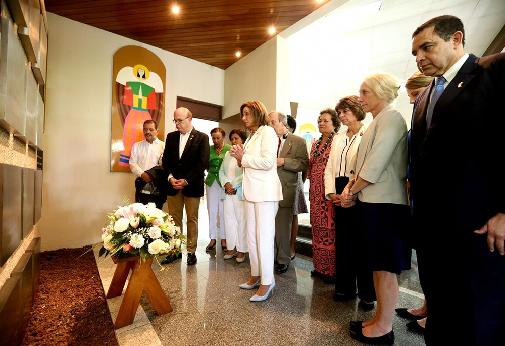 U.S. Rep. Jim McGovern, second from the left, stops with a congressional delegation in August 2019 at Central American University in San Salvador where six murdered Jesuit priests who influenced his work and faith are buried. McGovern led the delegation to El Salvador to study causes of migration. (CNS/Courtesy of Rep. Jim McGovern)