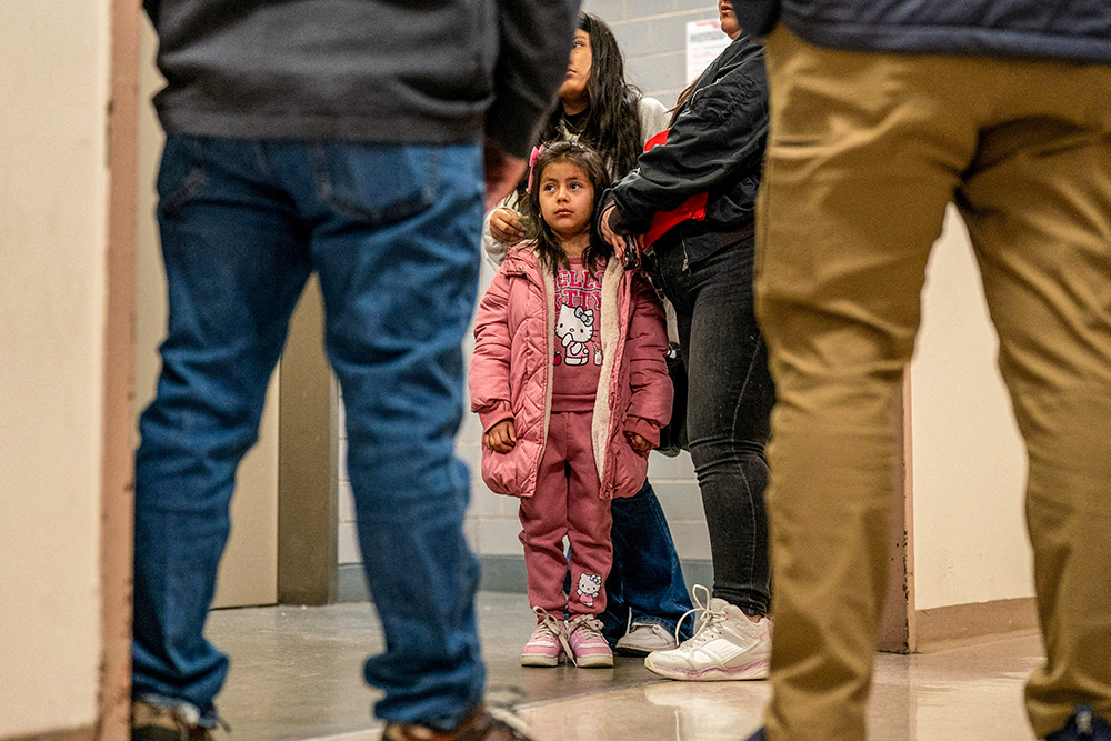 The family of a detained migrant speaks to immigration officers in an attempt to gain information at a U.S. immigration court in the Manhattan borough of New York City Jan. 16, 2026. (OSV News/Reuters/David 'Dee' Delgado)