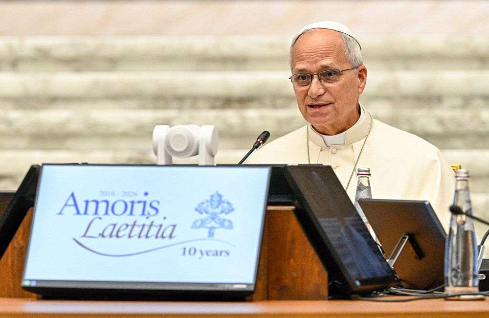 Pope Leo XIV speaks Oct. 7, 2026, as he opens the weeklong Vatican meeting of presidents of bishops' conferences marking the 10th anniversary of Amoris Laetitia. (OSV News/Vatican Media/Simone Risoluti)